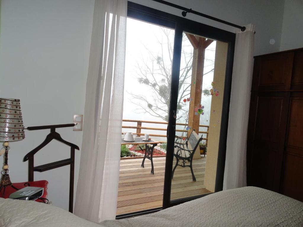 Bed and Breakfast Le Grand Noyer Ambronay Habitación foto